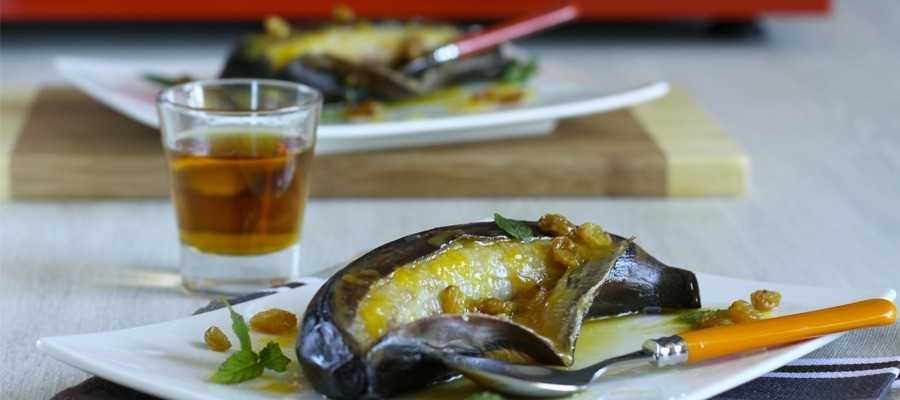 Geflambeerde bananen met sinaasappelsaus en druiven